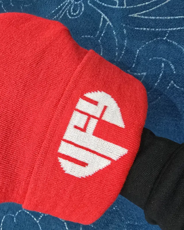 Red knitted beanie with a woven WFY logo, custom accessories, Wears For You, Sialkot Pakistan