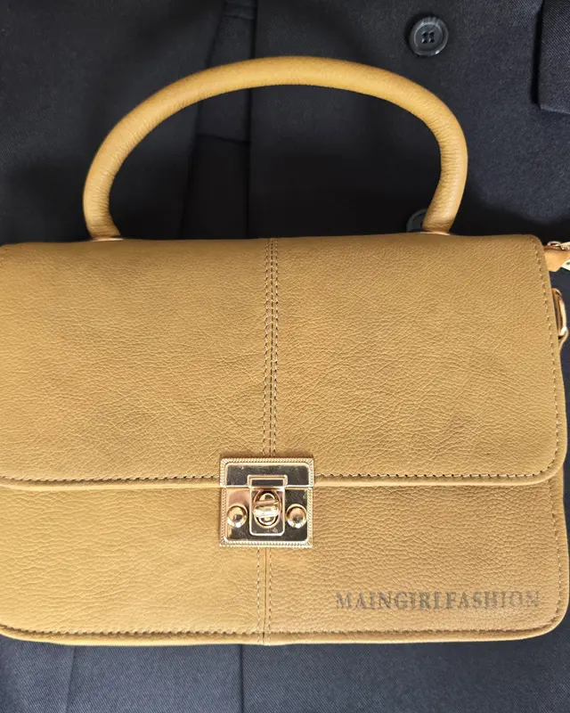 Tan leather handbag with a debossed client logo, custom leather goods, Wears For You, Sialkot Pakistan