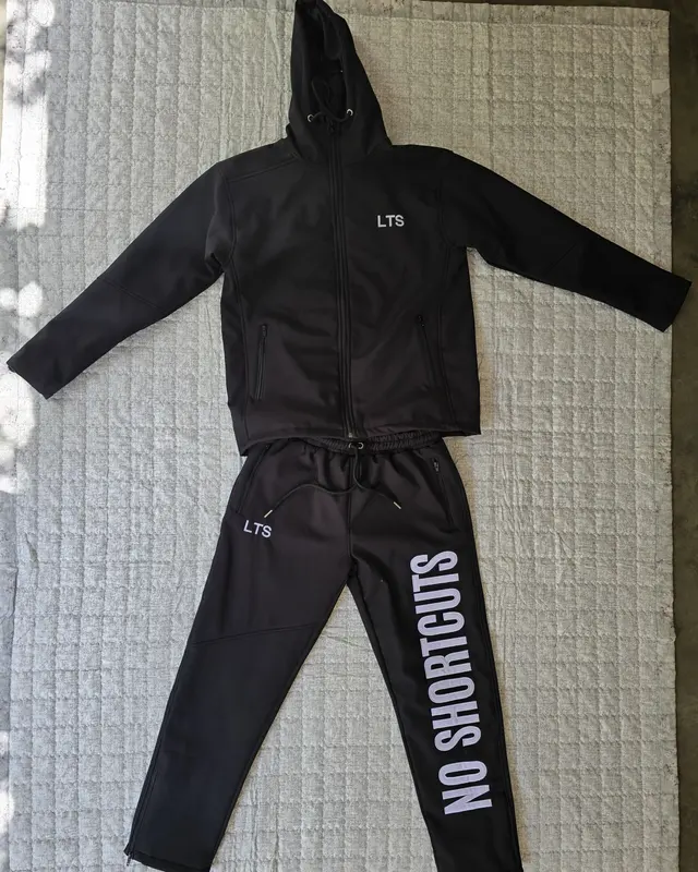 Black hooded tracksuit with a NO SHORTCUTS leg print, custom streetwear, Wears For You, Sialkot Pakistan