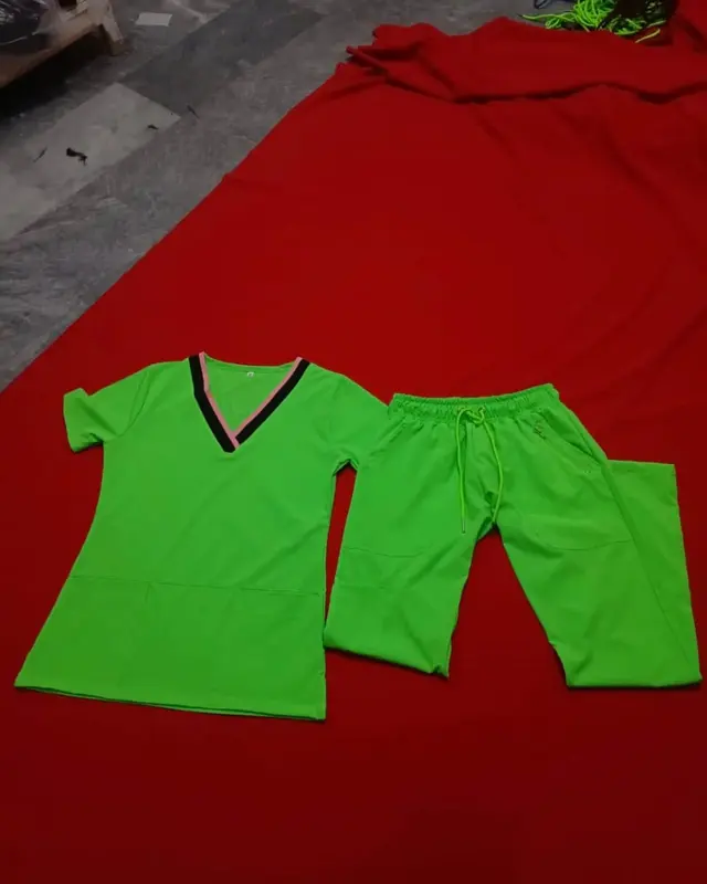 Green V-neck scrub top and trousers, custom medical scrubs, Wears For You, Sialkot Pakistan