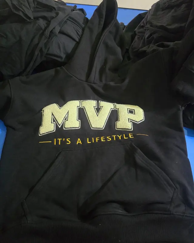 Black MVP hoodie with a gold chest print, custom streetwear, Wears For You, Sialkot Pakistan