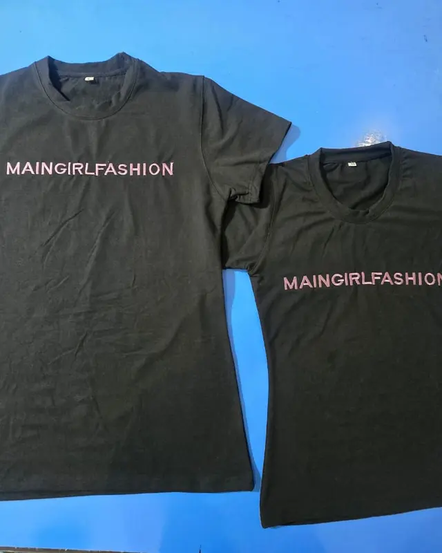 Two MAINGIRLFASHION printed tees in a mens and a womens fit, Wears For You, Sialkot Pakistan