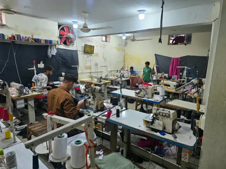 Sewing floor with machinists at work, private label clothing manufacturing, Wears For You, Sialkot Pakistan
