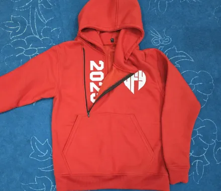 Custom red zip-up hoodie with embroidered logo, streetwear manufacturing, Wears For You, Sialkot Pakistan